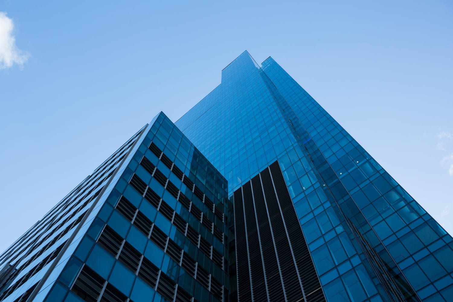 Modern skyscraper with blue glass facade